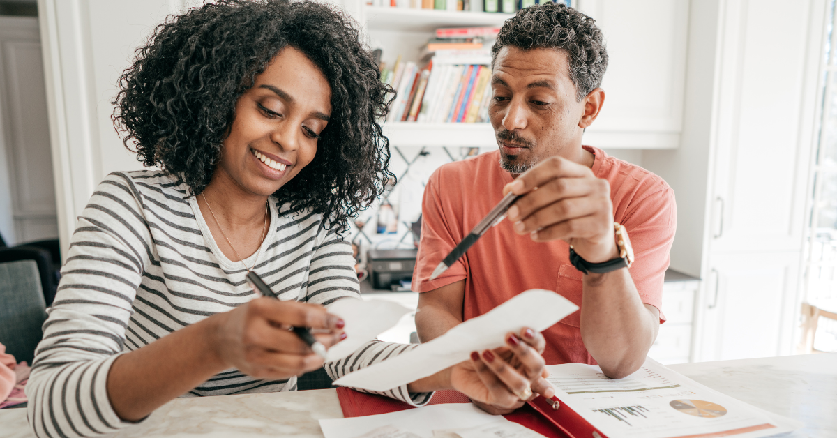 Man and woman looking at documents